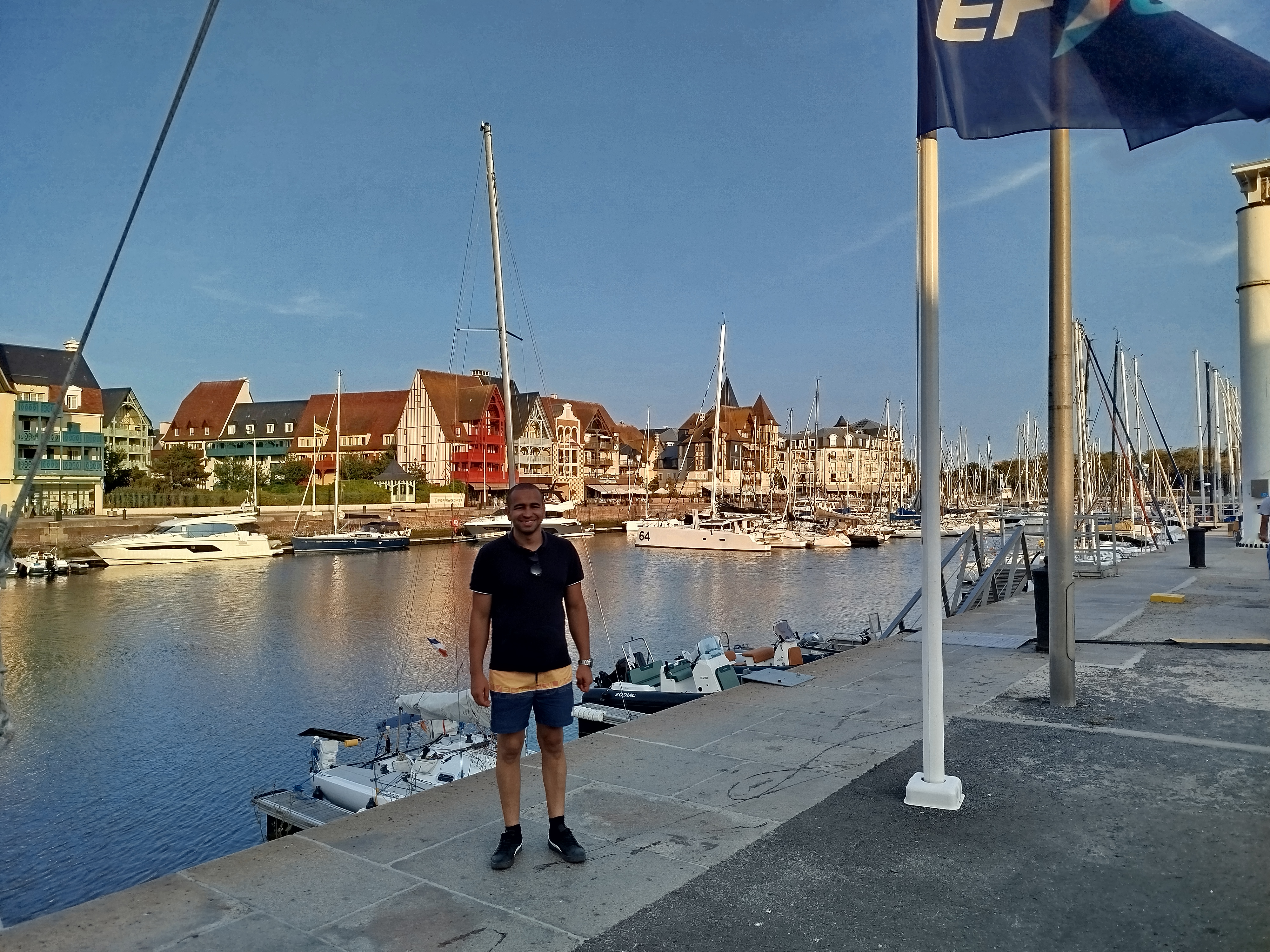 Fayçal near a marina in France